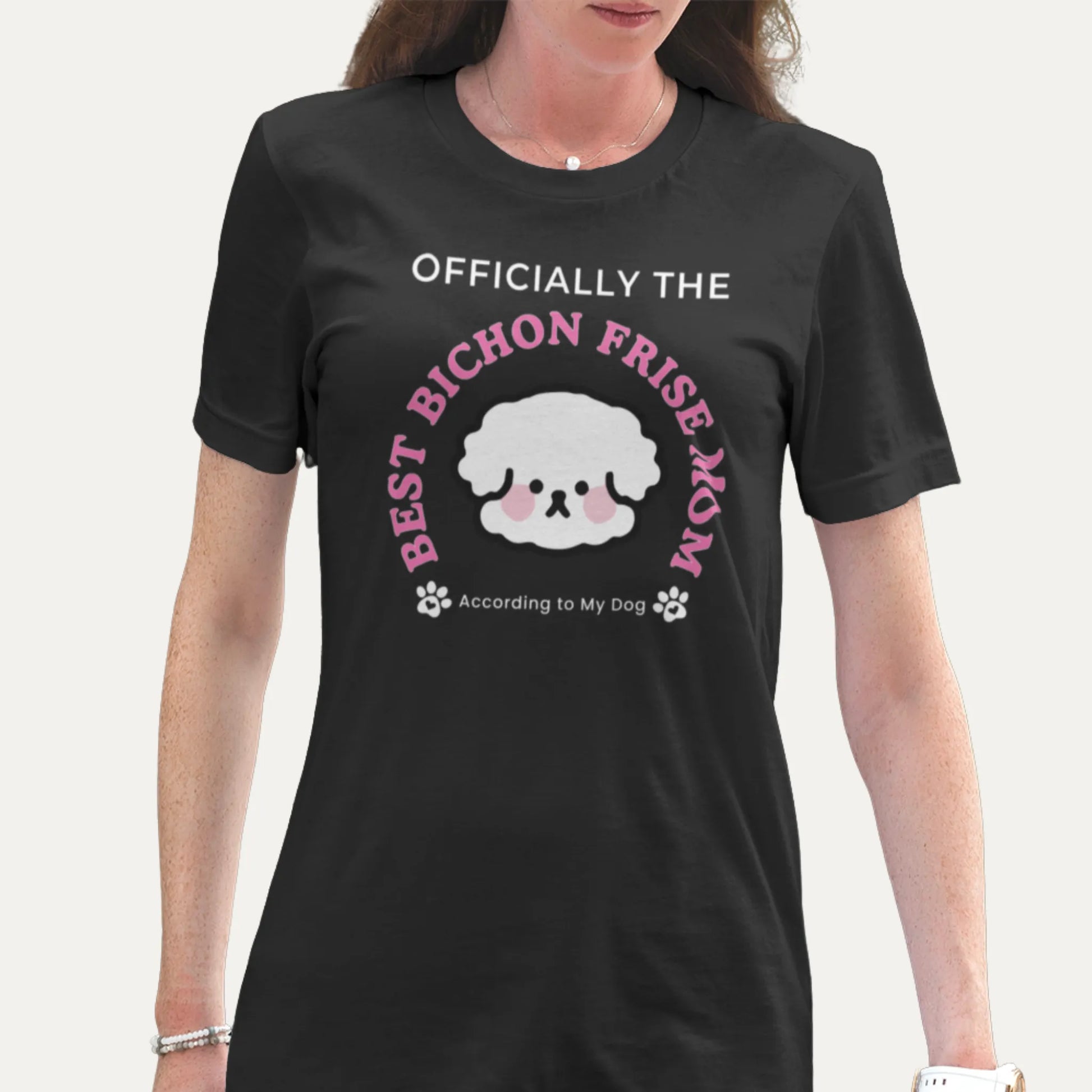 Black t-shirt with a graphic and text about Bichon Frise dogs worn by a person.