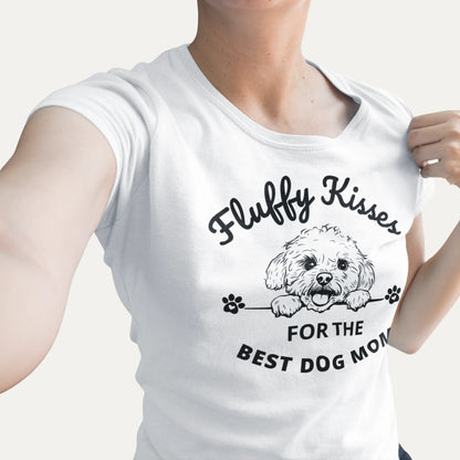 Fluffy Kisses for the Best Dog Mom unisex black t-shirt featuring a lively black and white Bichon Frise dog illustration and bold text design. Perfect for dog owners and lovers, this fun and vibrant shirt celebrates Bichon Frise fans and all dog moms
