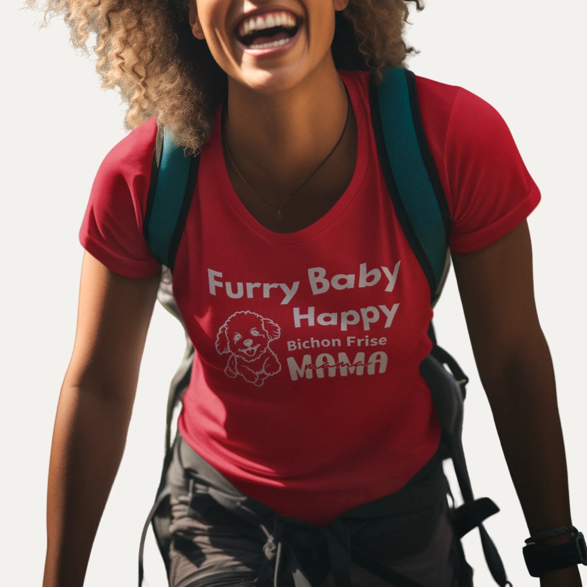 Person wearing a red t-shirt with 'Furry Baby Happy Bichon Frise Mama' text and graphic, standing against a plain background.
