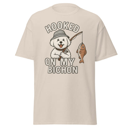 Natural t-shirt with ‘Hooked on My Bichon’ funny fishing dog dad graphic and text, perfect Father’s Day gift for dog lovers.