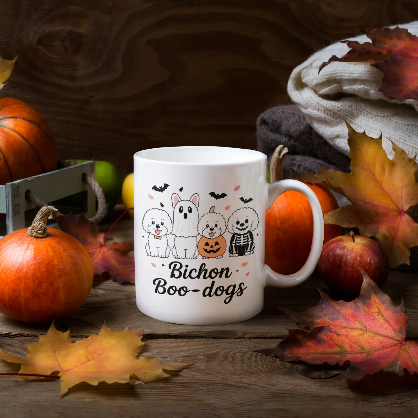 White ceramic mug with Bichon Frise Halloween design surrounded by pumpkins and autumn leaves – perfect fall coffee cup for dog lovers