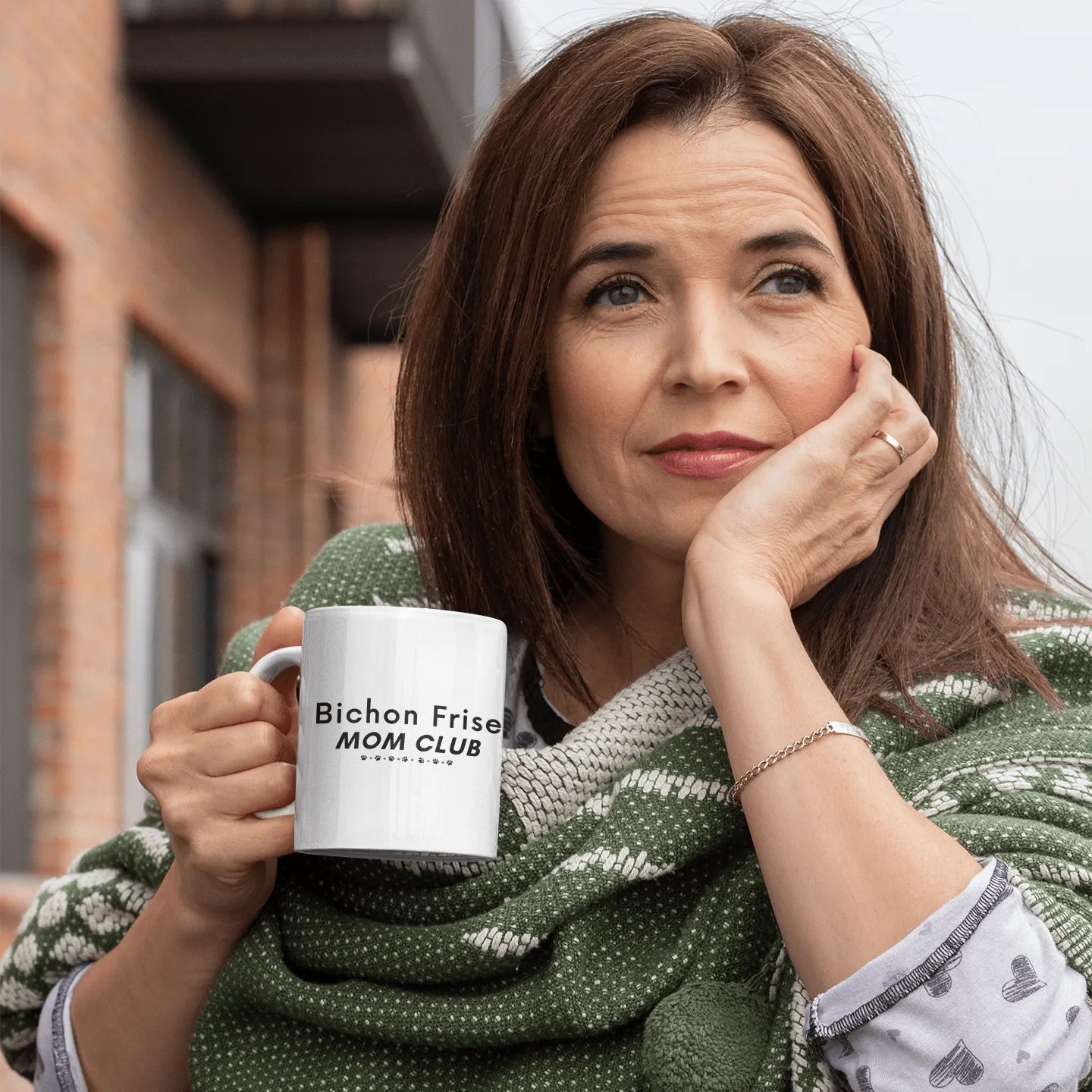"White glossy mug with black 'Bichon Frise Mom Club' text and paw print design – perfect Mother's Day gift for Bichon Frise dog owners and pet lovers."