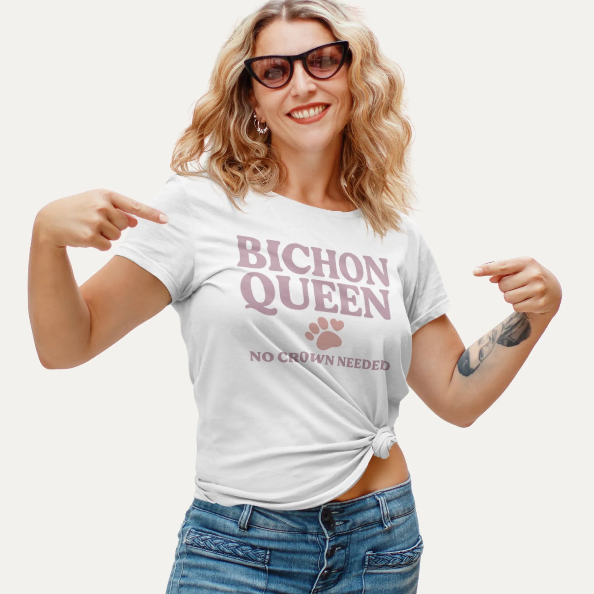 Retro-style design that reads "Bichon Queen – No Crown Needed" in dusty rose text with a cute paw print and heart. Perfect for dog lovers and Bichon Frise fans.