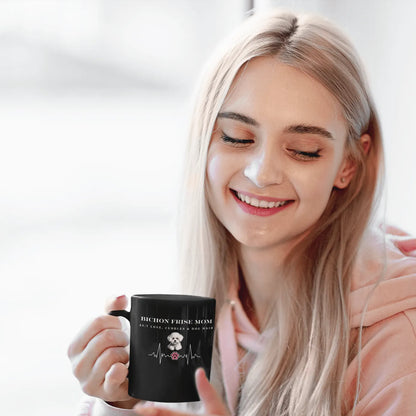“Black glossy mug with white ‘Bichon Mom: 24/7 Love, Cuddles & Dog Hair’ text and cute Bichon Frise dog illustration – perfect Mother’s Day gift for dog moms and Bichon Frise owners.”