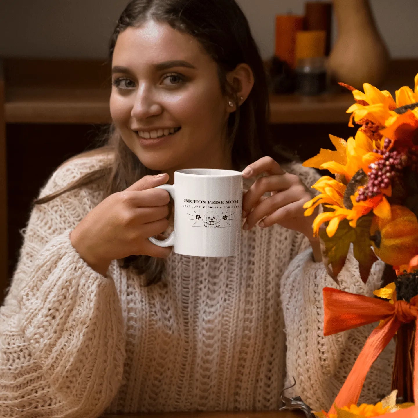"White glossy mug with 'Bichon Mom: 24/7 Love, Cuddles & Dog Hair' text, black paw print design and cute dog illustration – perfect Mother’s Day gift for Bichon Frise dog owners"