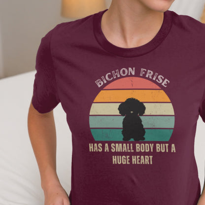 "Colorful unisex T-shirt featuring a cute black dog illustration with the quote 'Has a small body but a huge heart' – perfect for dog lovers, including but not limited to Bichon Frise fans; ideal for both men and women."
Video