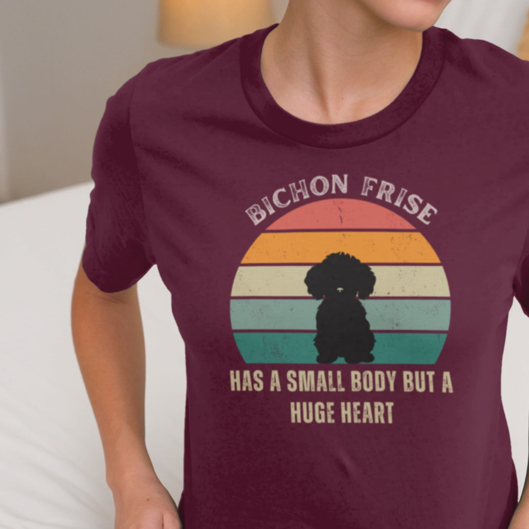 "Colorful unisex T-shirt featuring a cute black dog illustration with the quote 'Has a small body but a huge heart' – perfect for dog lovers, including but not limited to Bichon Frise fans; ideal for both men and women."
Video