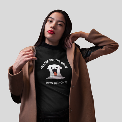 Spooky Halloween video of a woman in gothic costume holding a crystal ball, wearing a funny ghost-themed T-shirt with a Bichon Frise and the phrase “I’m here for the Boos and Bichons!