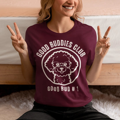 “Good Buddies Club unisex T-shirt featuring a cheerful, smiling Bichon Frise dog wearing glasses illustration with white design. Fun and happy dog-themed shirt for men and women, perfect for dog owners and dog lovers beyond just Bichon Frise fans.”