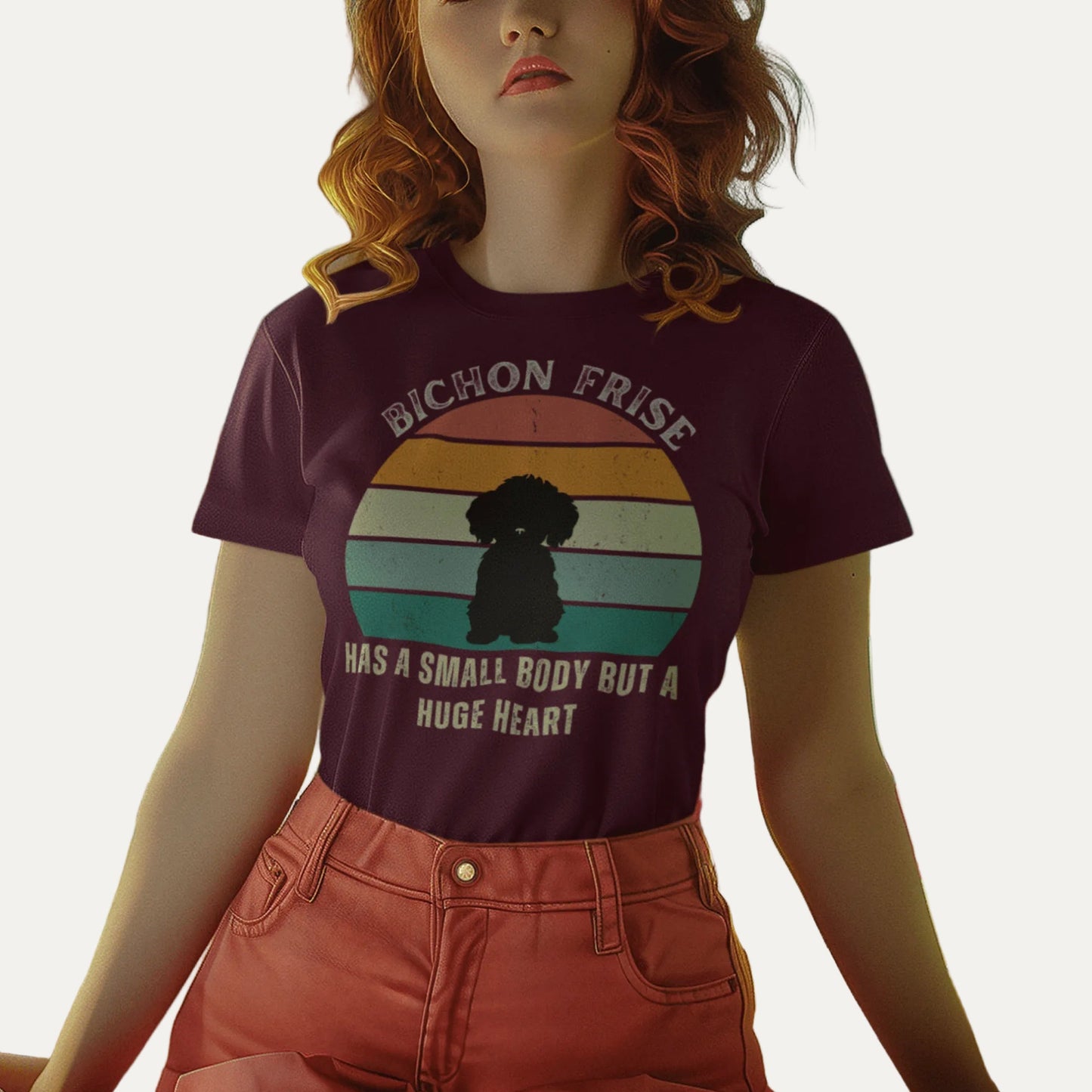 "Colorful unisex T-shirt featuring a cute black dog illustration with the quote 'Has a small body but a huge heart' – perfect for dog lovers, including but not limited to Bichon Frise fans; ideal for both men and women."